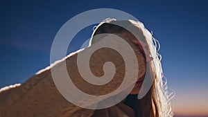 Festive woman clubbing sunset at outdoors party closeup. Night girl moving arms