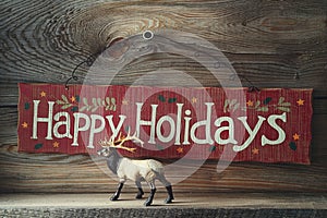 Festive wood sign for the holidays photo