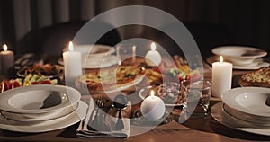 Festively decorated and beautifully served Thanksgiving table. Slider shot