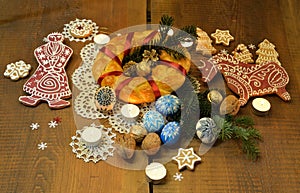 Festively decorated Christmas tree branches with candles