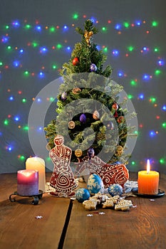 Festively decorated Christmas tree with candles and illumination
