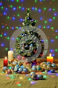 Festively decorated Christmas tree with candles and illumination