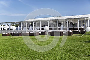 Festively decorated wedding gazebo in nature. Memorable beautiful celebration