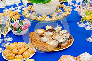 Festively laid tables at the Banquet. Various delicacies, snacks and drinks. Catering