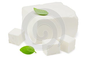 feta cheese with basil isolated on white background. Clipping path and full depth of field