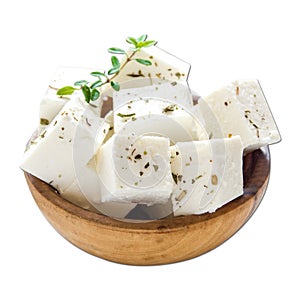 feta cheese cube served in a wooden bowl isolated on plain white background side view of fastfood