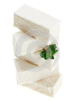 Feta cheese cubes with thyme twig