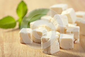 Feta cheese on cutting board