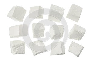 Feta cheese isolated on white background. With clipping path and full depth of field. Top view. Flat lay photo