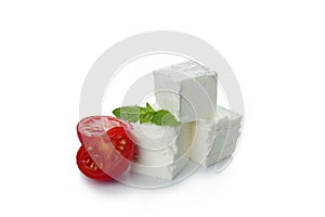 Feta cheese pieces isolated on white background