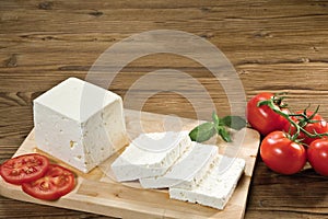 Feta greek turkish cheese on chopping board