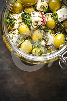 Feta with olives marinated in olive oil with spices