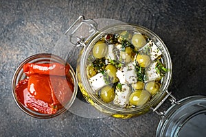 Feta with olives marinated in olive oil with spices and sun-dried tomatoes