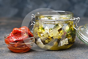 Feta with olives marinated in olive oil with spices and sun-dried tomatoes