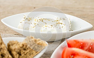 Feta, tomatoes and rusks. Greek healthy food.