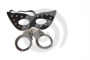 Fetish mask and a handcuff