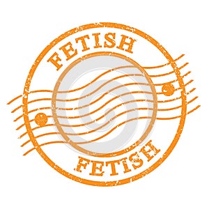 FETISH, text written on orange  postal stamp