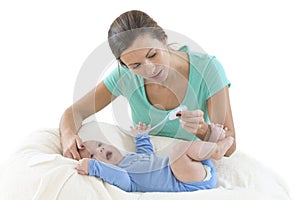 Fever,Mumn measuring temperature to a baby