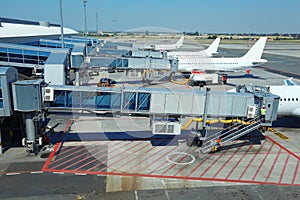 Few airliners parked at airport photo