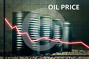 Few barrels of oil and a red graph down - decline in oil prices concept