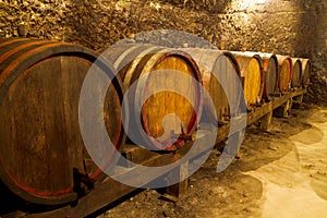 Few barrels in wine cellar