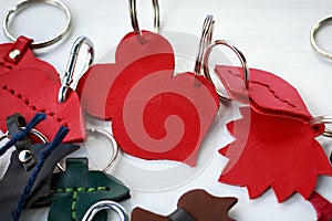 A few beautiful leather keychains in shape of heart handmade photo