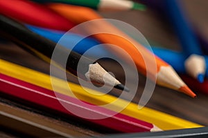 A few colored pencils. Close-up, selective focus