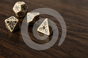 A few dice of a cream colored set