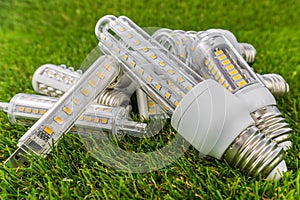 A few E27, USB and R7s LED bulbs in the grass