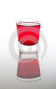 A few glasses of drinks in red