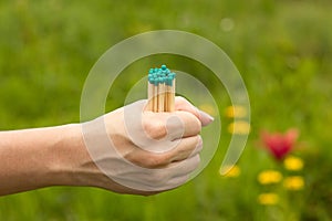 A few matches in a woman`s hand, close-up