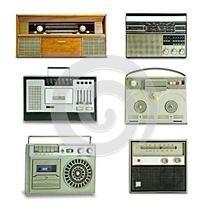 A few old radios on a white background photo