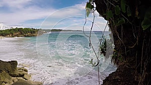 Few palm trees over tropical lagoon with white beach. Paradise island Nusa Lembongan, Bali, Indonesia. Blue water and