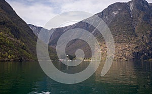 Few small rural houses in aurlandsfjord in early summer