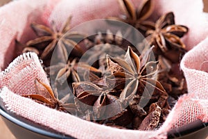 Few star-anis seeds on a bowl