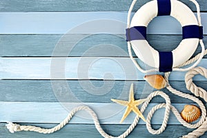 Few summer marine items on a wooden background.