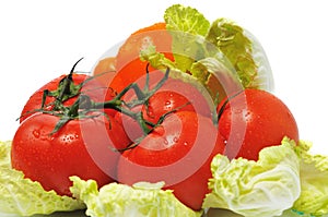 Few tomatos with leaves cabbage