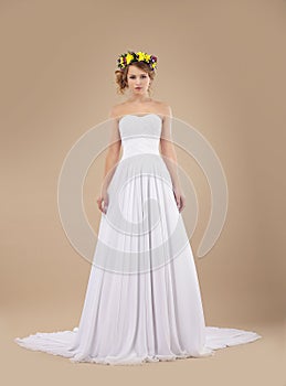 Fiancee Fashion Model with Wreath of Flowers in White Dress
