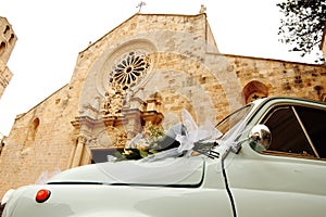 Fiat 500 car in front of the Cathedral of Otranto by marriage - Italy