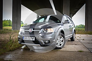 Fiat Freemont SUV under the highway overpass in Poland