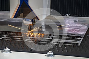 The fiber laser cutting machine control by CNC program system.
