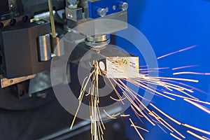 The fiber laser cutting machine cutting the square pipe