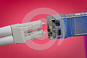 Fiber-optic cable connecting to SFP module
