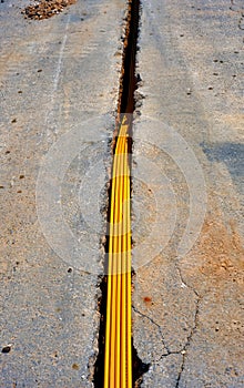 Fiber optic cables buried in a micro trench