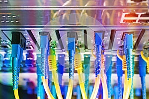 Fiber Optic cables connected to an optic ports