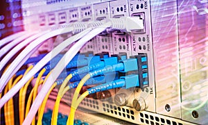 Fiber Optic cables connected to an optic ports