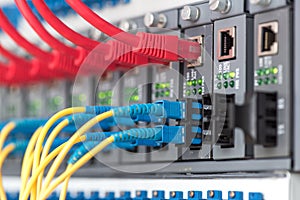 Fiber Optic cables connected to an optic ports