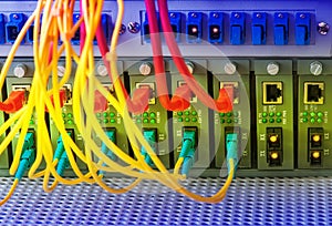 Fiber Optic cables connected to an optic ports