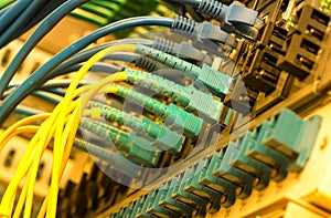 Fiber Optic cables connected to an optic ports