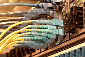 Fiber Optic cables connected to an optic ports